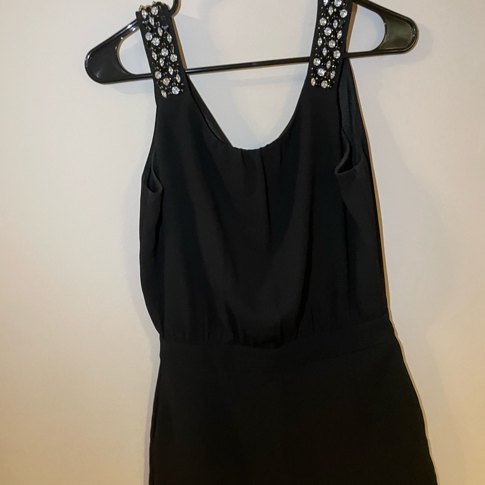 Zara black jumpsuit with jewelry
